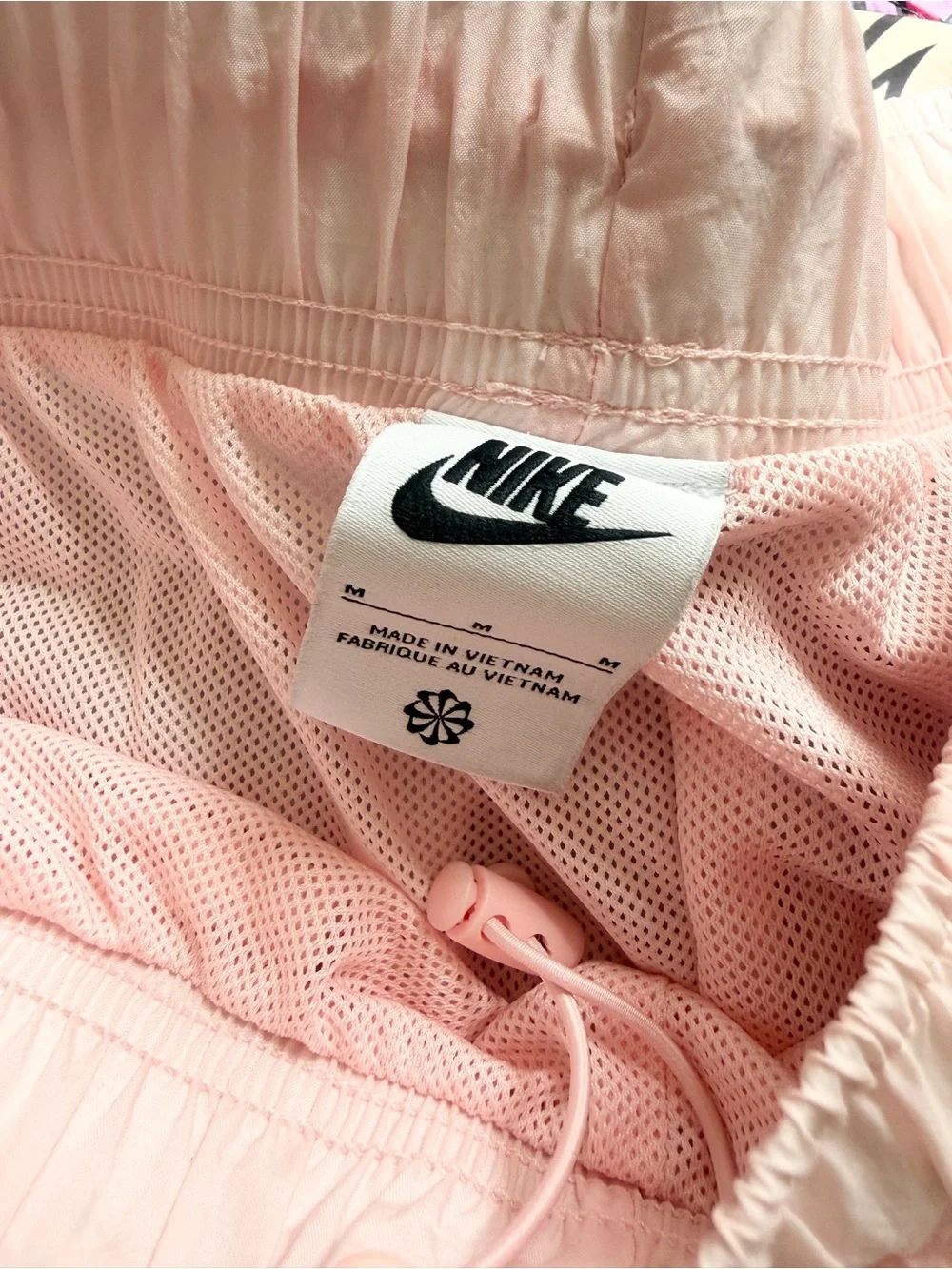 Nike MEDIUM high rise clash black swoosh light pink pocketed shorts